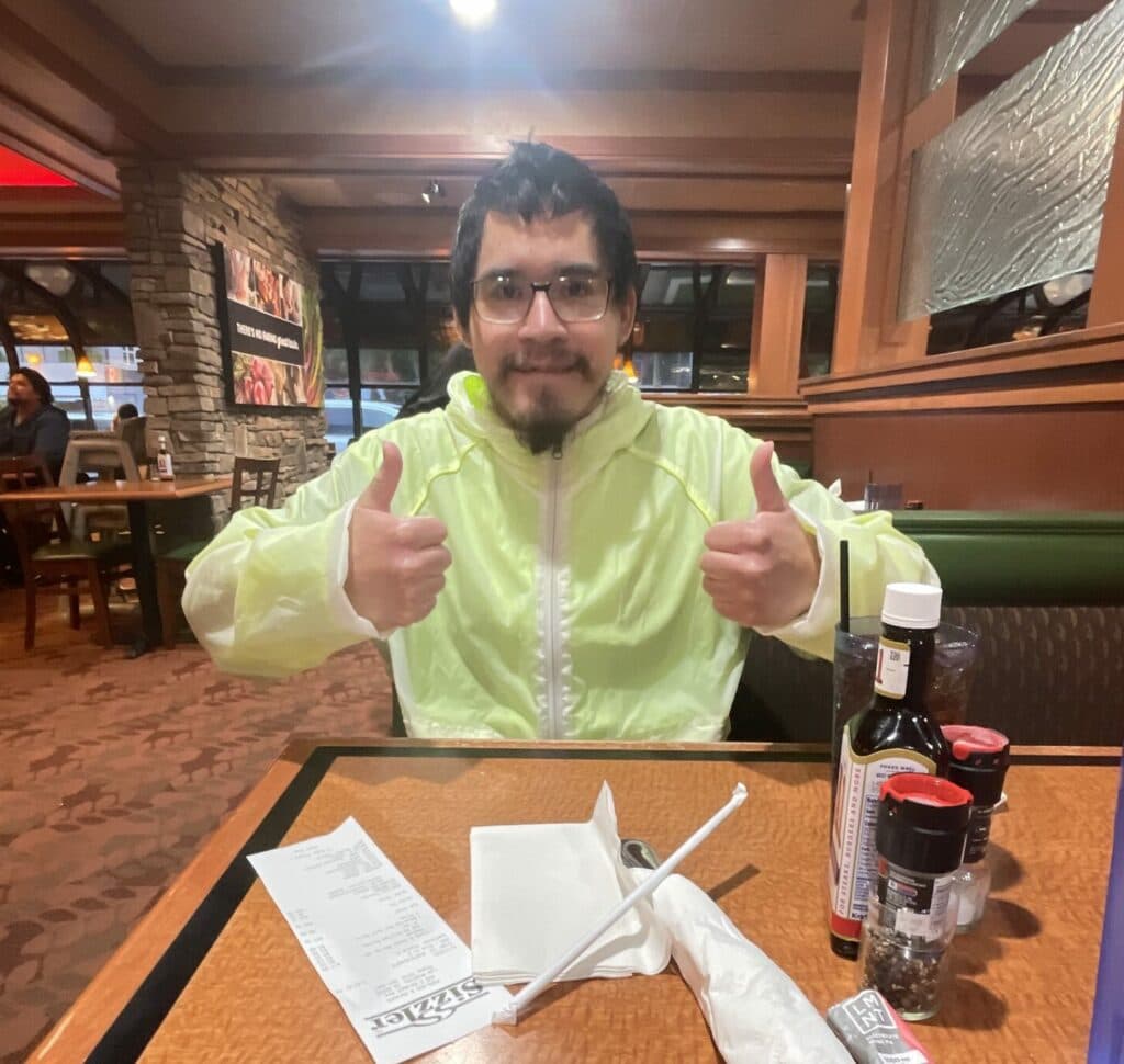 Roommates cooking dinner together