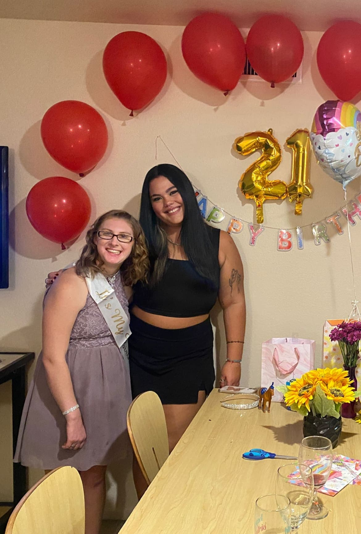 Natalia celebrating her 21st birthday with her supportive roommate Kate